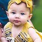Child, Toddler, Yellow, Baby, Skin, Cheek, Child Model, Headband, Hair Accessory, Headgear, Smile, Baby Products, Happy, Play, Person