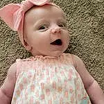 Face, Cheek, Skin, Head, Lip, White, Dress, Baby & Toddler Clothing, Neck, Sleeve, Textile, Iris, Smile, Pink, One-piece Garment, Toddler, Day Dress, Child, Baby, Happy, Person