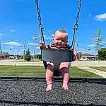 Sky, Cloud, Plant, Tree, Swing, Toddler, Baby, Happy, Grass, Playground, Leisure, City, Recreation, Electric Blue, Fun, People In Nature, Child, Pole, Outdoor Play Equipment, Play, Person