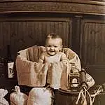 Smile, Baby, Shelf, Happy, Toddler, Bottle, Vintage Clothing, Room, Monochrome, Black & White, Sitting, Stock Photography, Classic, Baby Products, Child, Still Life Photography, Flash Photography, Photography, Portrait Photography, Person