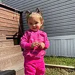 Clothing, Smile, Plant, Leaf, Purple, People In Nature, Sleeve, Standing, Happy, Baby & Toddler Clothing, Grass, Pink, Toddler, Jacket, Summer, Child, Magenta, Wood, Tree, Fun, Person, Joy