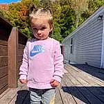 Clothing, Sky, Plant, Sleeve, Tree, People In Nature, Wood, Toddler, Leisure, Grass, Baby & Toddler Clothing, Fun, Electric Blue, Happy, Door, Recreation, Magenta, Child, Waist, T-shirt, Person