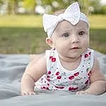 Child, Baby, Face, Photograph, White, Skin, Toddler, Head, Pink, Lip, Eyes, Cheek, Grass, Headgear, Baby & Toddler Clothing, Summer, Dress, Photography, Smile, Person, Headwear
