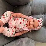 Skin, Head, Arm, Eyes, Facial Expression, Comfort, Leg, Baby & Toddler Clothing, Human Body, Textile, Sleeve, Dress, Baby, Finger, Thigh, Pink, Grass, Toddler, Knee, Person, Joy, Headwear