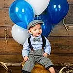 Head, White, Blue, Balloon, Standing, Happy, Pink, Toddler, Fun, Electric Blue, Flash Photography, Child, Party Supply, Leisure, T-shirt, Event, Magenta, Baby & Toddler Clothing, Sitting, Fashion Accessory, Person, Headwear