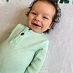 Face, Cheek, Smile, Skin, Head, Eyebrow, Eyes, Facial Expression, White, Textile, Sleeve, Comfort, Baby & Toddler Clothing, Happy, Iris, Collar, Flash Photography, Toddler, Linens, Pattern, Person, Joy