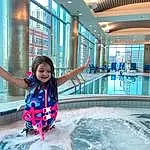 Water, Smile, Azure, Swimming Pool, Building, Leisure, Happy, Fun, Toddler, Recreation, Travel, Vacation, Tourism, Leisure Centre, Personal Protective Equipment, Child, Physical Fitness, Resort, Person, Joy