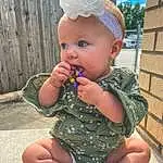 Cheek, Skin, Baby & Toddler Clothing, Plant, Grass, Baby, Toddler, Happy, Sneakers, Cap, Fun, Thumb, Hat, Sitting, Cloud, Sky, Child, Fashion Accessory, Vacation, Foot, Person, Surprise
