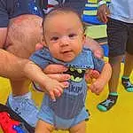 Footwear, Joint, Shorts, Shoe, Arm, Sneakers, T-shirt, Grass, Toddler, Leisure, Baby, People, Smile, Baby & Toddler Clothing, Child, Sock, Fun, Happy, Event, Person