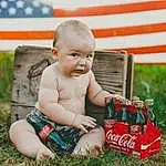 Plant, People In Nature, Happy, Toy, Baby, Toddler, Grass, Lawn, Child, Leisure, Sitting, Holiday, Human Leg, Fun, Carbonated Soft Drinks, Drink, Grassland, Recreation, Play, Person