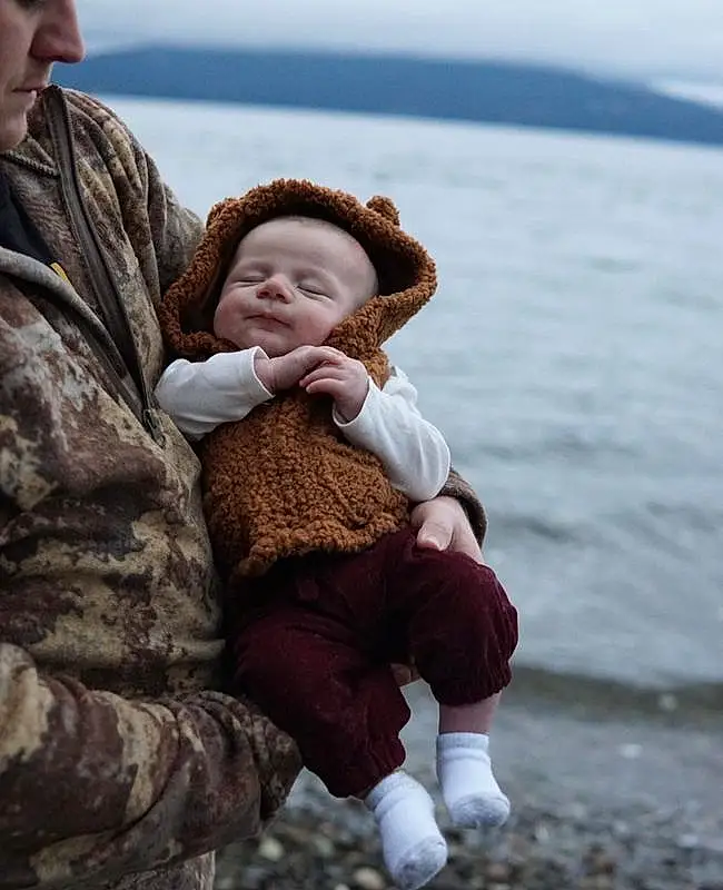 Face, Water, Skin, Hand, Outerwear, Eyes, Sky, Smile, Flash Photography, Standing, Happy, Gesture, People In Nature, Lake, Toddler, Baby, Comfort, Child, Wood, Leisure, Person