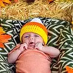 Photograph, Facial Expression, Pumpkin, Plant, Green, Orange, Calabaza, Cucurbita, Winter Squash, Baby & Toddler Clothing, Yellow, Grass, Natural Foods, Baby, Happy, People In Nature, Squash, Gourd, Toddler, Child, Person, Headwear
