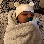 Eyes, Comfort, Textile, Baby, Baby Sleeping, Toddler, Linens, Furry friends, Child, Winter, Knit Cap, Pattern, Bedding, Freezing, Wool, Room, Shawl, Cap, Bedtime, Person