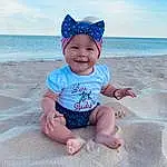 Face, Water, Smile, Sky, Cloud, Blue, Azure, Hat, Baby & Toddler Clothing, Sleeve, Standing, Beach, Sunlight, Happy, Pink, Toddler, Fun, Morning, Baby, Person, Joy, Headwear