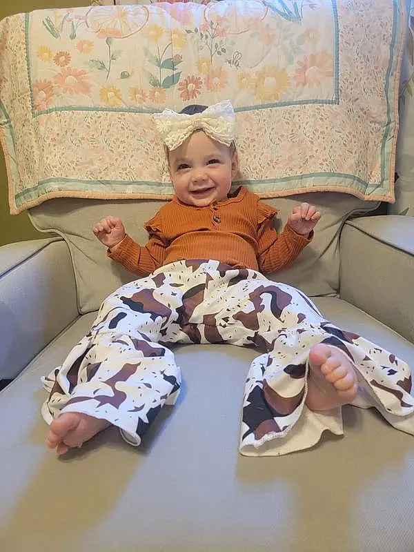 Comfort, Sleeve, Baby & Toddler Clothing, Baby, Linens, Child, Toddler, Pattern, Room, Bedding, Baby Products, Baby Sleeping, Thigh, Chair, Bed Sheet, Person, Joy, Headwear
