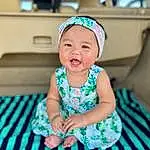 Clothing, Face, Skin, Smile, Green, Azure, Blue, Baby & Toddler Clothing, Sleeve, Purple, Standing, Flash Photography, Happy, Pink, Dress, Toddler, Aqua, Cap, Child, Person, Headwear