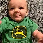 Face, Nose, Hair, Cheek, Head, Smile, Mouth, Eyes, Leaf, Baby & Toddler Clothing, Human Body, Sleeve, Plant, Standing, Happy, T-shirt, Grass, Cool, Toddler, Person