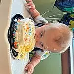 Food, Blue, Fun, Chair, Happy, Cake, Leisure, Child, Party Supply, Baby, Birthday Cake, Toddler, Dessert, Dairy, Fast Food, Sweetness, Buttercream, Pastry, Room, Baking, Person