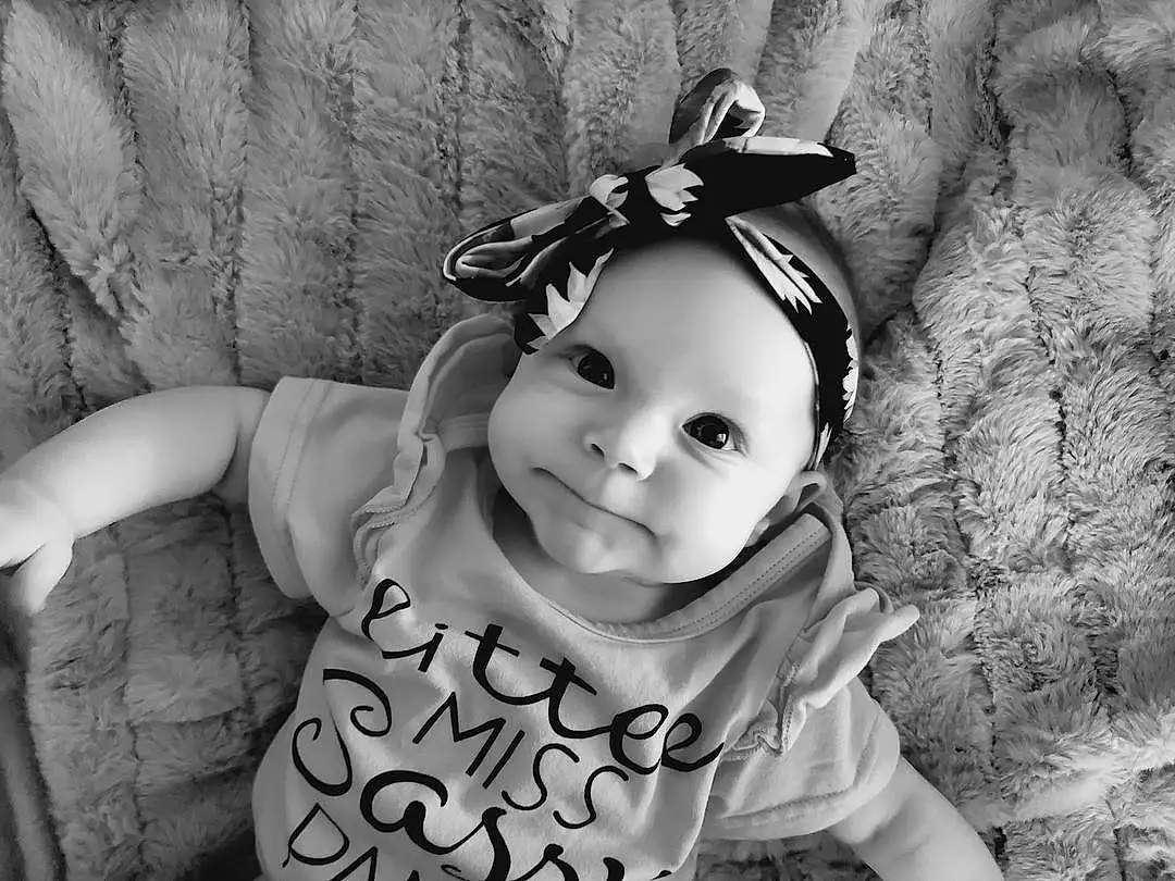 Smile, Photograph, White, Flash Photography, Happy, Baby & Toddler Clothing, Style, Black-and-white, Headgear, Toddler, Headpiece, Monochrome, Baby, Black & White, Costume Hat, Headband, Hair Accessory, Art, Fashion Accessory, Child, Person, Headwear