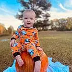 Sky, Cloud, Flash Photography, Plant, Sleeve, Happy, Dress, Tree, Baby & Toddler Clothing, People In Nature, Grass, Baby, Toddler, Leisure, Child, Fun, Sitting, Recreation, T-shirt, Human Leg, Person