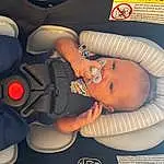 Arm, Mouth, Muscle, Comfort, Finger, Automotive Design, Child, Baby, Car Seat, Space, Personal Protective Equipment, Toddler, Baby Products, Service, Carmine, Room, Vehicle Door, Auto Part, Person