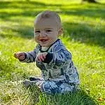 Smile, Plant, Eyes, People In Nature, Leaf, Happy, Sunlight, Grass, Toddler, Baby, Baby & Toddler Clothing, Grassland, Groundcover, Meadow, Natural Landscape, Lawn, Prairie, Landscape, Child, Fun, Person, Joy