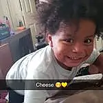 Forehead, Nose, Face, Cheek, Skin, Chin, Hairstyle, Smile, Eyebrow, Shoulder, Eyes, Mouth, Sleeve, Comfort, Cool, Happy, Toddler, Black Hair, Afro, Baby & Toddler Clothing, Person, Joy