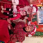 Textile, Christmas Ornament, Plant, Tartan, Pink, Red, Tree, Smile, Christmas Tree, Christmas Decoration, Fun, Happy, Event, Holiday, Plaid, Christmas, Toy, Christmas Eve, Pattern, Design, Person, Headwear, Joy