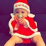 Face, Head, Santa Claus, Baby & Toddler Clothing, Pink, Headgear, Red, Cap, Toddler, Hat, Lap, Entertainment, Event, Baby, Fictional Character, Holiday, Thigh, Glove, Human Leg, Carmine, Person, Headwear