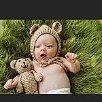 Child, Photograph, Baby, Toddler, Cheek, Photography, Stock Photography, Grass, Teddy Bear, Stuffed Toy, Fawn, Ear, Toy, Person, Headwear