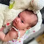 Face, Nose, Cheek, Skin, Hand, White, Baby & Toddler Clothing, Baby, Iris, Pink, Happy, Headgear, Toddler, Child, Baby Products, Baby Sleeping, Stuffed Toy, Wool, Event, Person