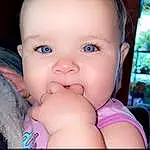 Nose, Cheek, Skin, Lip, Mouth, Eyelash, Baby & Toddler Clothing, Neck, Iris, Baby, Gesture, Finger, Pink, Happy, Toddler, Child, Thumb, Nail, Chest, Pattern, Person