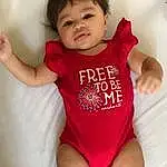 Cheek, Skin, White, Baby & Toddler Clothing, Neck, Sleeve, Gesture, Happy, Finger, Red, Pink, Thigh, Elbow, Toddler, Thumb, T-shirt, Shorts, Baby, Human Leg, Trunk, Person
