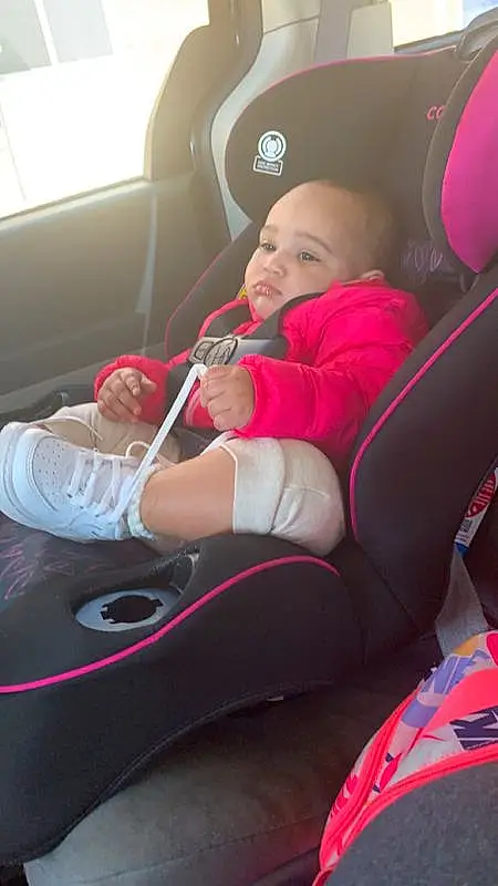 Seat Belt, Mouth, Comfort, Automotive Design, Vroom Vroom, Automotive Exterior, Vehicle Door, Car Seat, Pink, Car Seat Cover, Steering Wheel, Steering Part, Auto Part, Toddler, Thigh, Head Restraint, Child, Leisure, Recreation, Family Car, Person