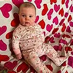 Face, Skin, Comfort, Baby & Toddler Clothing, Textile, Sleeve, Pink, Baby, Toddler, Red, Pattern, Magenta, Thigh, Happy, Linens, Child, Sitting, Peach, Carmine, Person