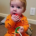 Cheek, Head, Orange, Baby & Toddler Clothing, Yellow, Sleeve, Toddler, Baby, Child, Fun, Goggles, Light Switch, Sitting, Wall Plate, Baby Toys, Play, Musical Instrument, Toy, Thumb, Baby Products, Person, Surprise