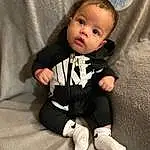 Face, Cheek, Head, Baby & Toddler Clothing, Sleeve, Comfort, Collar, Toddler, Baby, Flash Photography, Knee, Dress Shirt, Wood, Formal Wear, Sock, Sitting, Child, Linens, T-shirt, Person