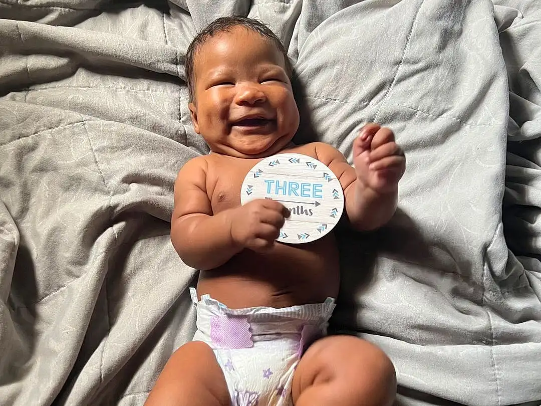 Face, Skin, Head, Hand, Smile, Arm, Stomach, Facial Expression, Muscle, Shorts, Comfort, Gesture, Happy, Finger, Thigh, Baby, Toddler, Diaper, Chest, Person