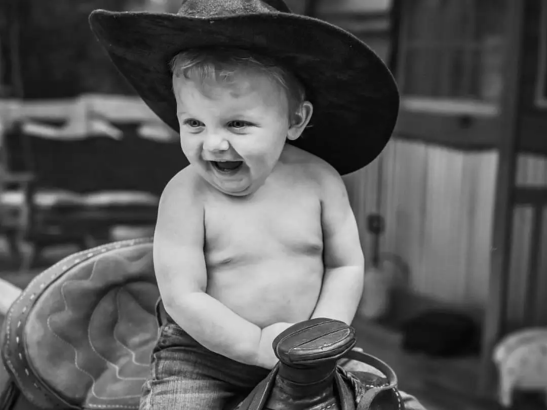 Hat, Horse, Sun Hat, Black-and-white, Style, Headgear, Working Animal, Cool, Cowboy Hat, Child, Black & White, Monochrome, Horse Tack, Street, Toddler, Sitting, Fashion Accessory, Stock Photography, Road, Rein, Person