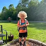Footwear, Plant, Sky, Tree, People In Nature, Dress, Happy, Sunlight, Outdoor Recreation, Leisure, Grass, Wood, Fun, Toddler, Recreation, Landscape, Blond, Pattern, Child, Play, Person, Joy