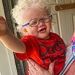 Glasses, Face, Joint, Skin, Hand, Arm, Vision Care, Shoulder, Eyes, Facial Expression, Mouth, Gesture, Eyewear, Finger, Thumb, Happy, Fun, Toddler, Elbow, Child, Person