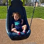 Plant, Tree, Swing, Sky, Comfort, Tire, Grass, Leisure, Toddler, Fun, Playground, Recreation, City, Baby & Toddler Clothing, Outdoor Play Equipment, Sitting, Automotive Tire, Electric Blue, Automotive Wheel System, Baby Products, Person