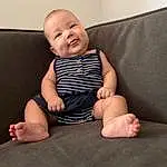 Skin, Joint, Smile, Leg, Comfort, Flash Photography, Baby, Sleeve, Baby & Toddler Clothing, Knee, Gesture, Wood, Toddler, Happy, Thigh, Sock, Foot, Barefoot, Elbow, Person
