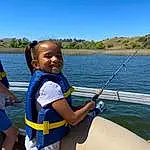 Water, Sky, Boat, Smile, Boats And Boating--equipment And Supplies, Shorts, Lifejacket, Lake, Travel, Leisure, Summer, Tree, Personal Protective Equipment, Recreation, Watercraft, Toddler, Water Transportation, Fun, T-shirt, Person, Joy