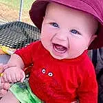 Face, Cheek, Skin, Head, Smile, Lip, Eyes, Facial Expression, Green, Mouth, Baby & Toddler Clothing, Human Body, Cap, Sleeve, Hat, Sun Hat, Pink, Baby, Person, Headwear