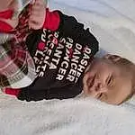 Skin, Hand, Comfort, Textile, Sleeve, Baby & Toddler Clothing, Gesture, Tartan, Baby, Happy, Toddler, Tree, Plaid, Smile, Child, Wood, Linens, Pattern, Baby Products, Sitting, Person