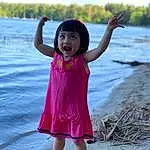 Pink, Facial Expression, Child, Skin, Beauty, Smile, Water, Summer, Vacation, Happy, Sea, Fun, Dress, Photography, Child Model, Play, Toddler, River, Gesture, Person