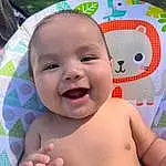 Nose, Smile, Cheek, Skin, Head, Lip, Chin, Mouth, Green, Facial Expression, Happy, Baby, Gesture, Pink, Fun, Finger, Thumb, Toddler, Baby Laughing, Person