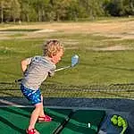 Playing Sports, Shoe, Shorts, Green, Golf Equipment, Sports Equipment, People In Nature, Tree, Outdoor Recreation, Grass, Leisure, Sky, Sneakers, Golf, Fun, Recreation, Ball, Lawn, Golf Club, Sports, Person