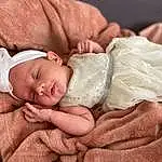 Child, Baby, Skin, Toddler, Baby Sleeping, Sleep, Headgear, Hand, Birth, Hair Accessory, Person, Headwear
